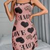 3pcs set, Women’s casual polyester camisole nightgown suit with heart-shaped prints, made of fabric. It’s comfortable for home leisure, can be worn as loungewear, and is sexy enough to be worn outdoors.